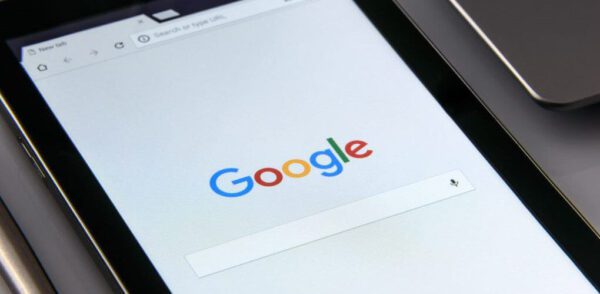 black samsung tablet displaying google browser on screen